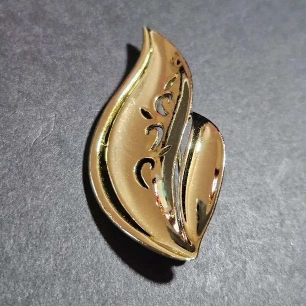 AJC vintage gold tone brooch